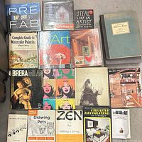 Front view of all 16 books laid out in grid showing titles and covers