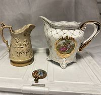 Overall view of both carafes and lamp finial