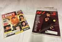 Ebony and Hits magazines side by side in sleeves