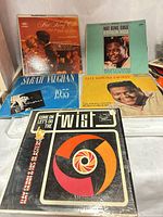 All five LP record sleeves laid out