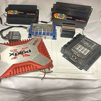 Group shot of all amplifiers and connector