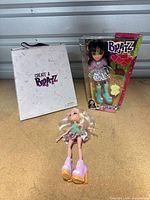 Overall view of boxed Sweet Style doll, boxed Create a Bratz set, and loose Bratz doll