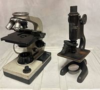 Both microscopes side by side showing overall design and size comparison