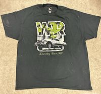 Front view of WAR band T-shirt showing graphic and overall condition