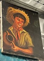 Oil painting of boy with straw hat and jug on canvas in frame