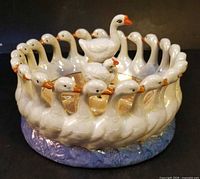 Overall view of duck ring float bowl with frog insert