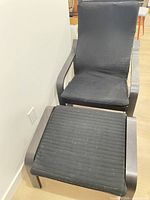 Armchair and ottoman together showing overall style and materials