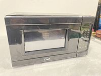 Front view of black Master Chef microwave