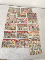 Full view of all stamp packets and loose stamps on surface