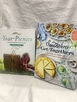 Front covers of both cookbooks side by side