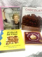 Front covers of all four cookbooks