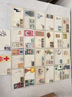 All 26 Thailand first day covers laid out in rows