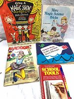 Group shot showing all five books