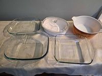 All five bakeware pieces grouped together on table
