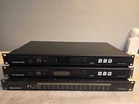 Front view of two Capture-HD units stacked over one CEN-SWPOE-16 switch