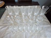 Full set laid out showing all 18 glasses in three rows
