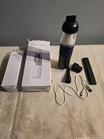 Vacuum with all accessories and boxes laid out