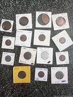 Overview of all 14 coins in holders