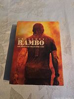 Front of collector slip-case box showing Rambo artwork