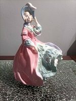 Front view of Royal Doulton Spring Morning figurine showing overall design and colors