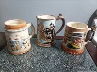 All three mugs side by side on table