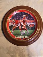 Front view of framed Joe Montana Super Bowl XXIII plate