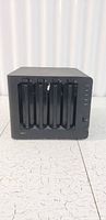Front view of Synology DS413 with closed bay covers