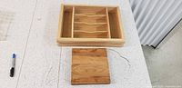 Drawer organizer and cutting board front view