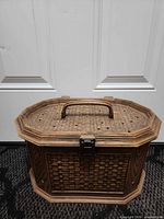 Front view of Lerner woven-look plastic sewing box closed