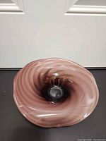 Top view showing mauve interior swirl design