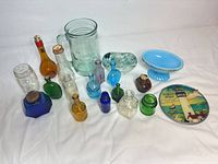 Group shot showing all glass items and souvenir plate