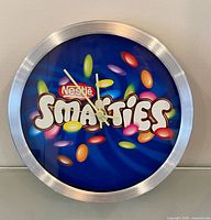 Front view showing Smarties logo and dial
