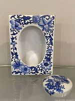 Front view of porcelain frame and lid