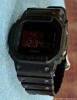 Front view of Casio G-Shock DW-5600BB-1DR showing bezel, display and strap