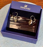 Earrings displayed in original blue Swarovski box