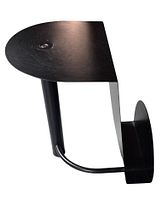 angled view showing tabletop, support column, and curved magazine rack element