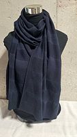 Full view of scarf draped on mannequin