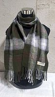 Full view of plaid cashmere scarf on mannequin