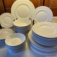 Stacked view of plates and bowls showing full set