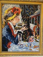 full view of framed needlepoint artwork