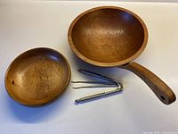 Handled maple nut bowl, shell bowl, nutcracker, two picks overview