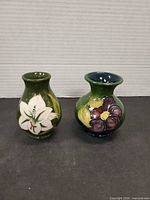 Both Moorcroft bud vases front view