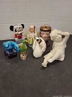 Group shot of all seven assorted figurines