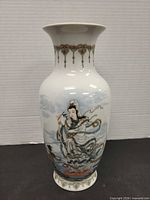 Front view showing Guanyin image, overall shape