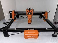 Full view of ACMER laser engraver with frame and laser head