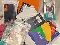 Group of assorted packaged phone cases