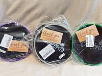 Three packaged core slider sets showing colors and labels