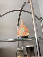 Close detail of top arch and missing decorative ball