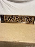 Incense burner top view showing carved floral motif and color