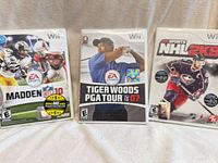 Front view of all three Wii game cases
